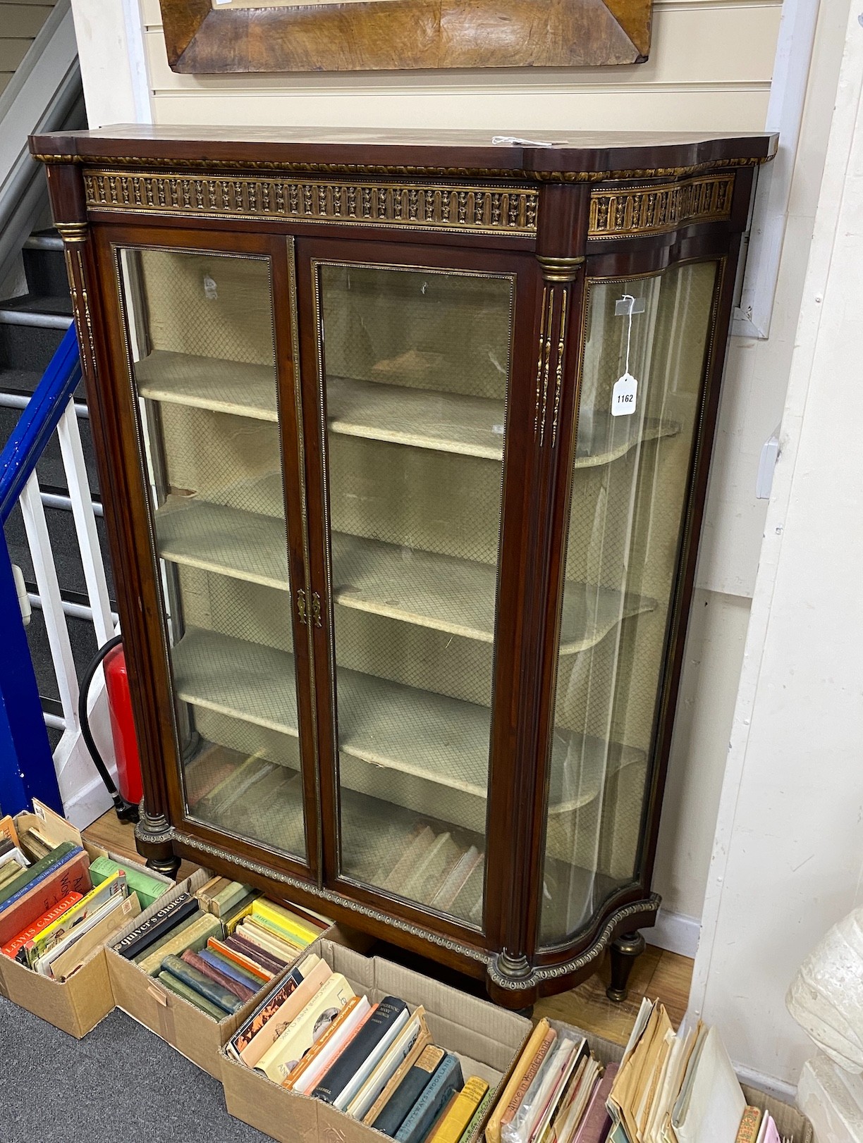 An early 20th century Louis XVI style mahogany and gilt metal mounted vitrine, width 119cm, height 157cm